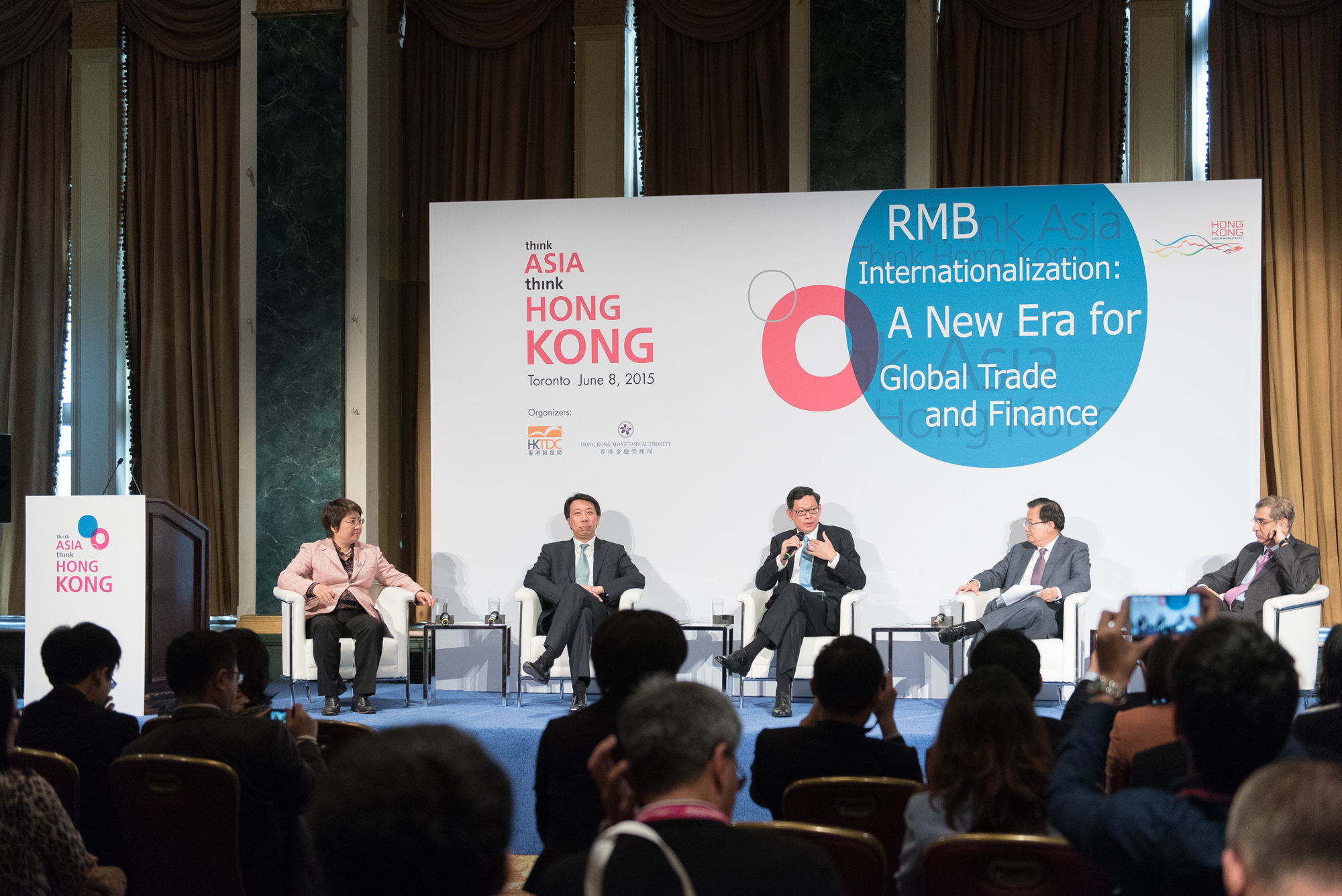 Mr Norman Chan, Chief Executive of the HKMA (middle) leads the panel discussion at the seminar. Panel members include (from left to right): Ms Ding Chen, Chief Executive Officer, CSOP Asset Management Limited; Mr Benjamin Hung, Regional Chief Executive Officer, Greater China, Standard Chartered Bank (Hong Kong) Limited; Mr Gao Yingxin, Executive Vice President, Bank of China; and Mr Romnesh Lamba, Co-Head of Global Markets, Hong Kong Exchanges and Clearing Limited.