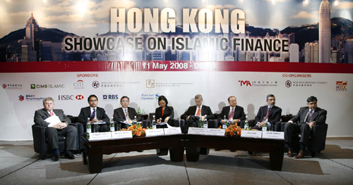 The panel session on "Tapping Islamic Finance Opportunities in Hong Kong". From left to right: Craig B. Lindsay Managing Director, CITIC Securities International; Muzaffar Hisham, Deputy Chief Executive Officer, CIMB Islamic Bank; James H. Lau Jr., Chief Executive Officer, Hong Kong Mortgage Corporation; Anita Fung (moderator), Treasurer and Head of Global Markets, Asia-Pacific, The Hongkong and Shanghai Banking Corporation Limited; Martin Wheatley, Chief Executive Officer, Securities and Futures Commission Hong Kong; Lawrence Fok, Executive Vice President, Hong Kong Exchanges and Clearing Limited; Afaq Khan, Chief Executive Officer, Standard Chartered Saadiq; and Rushdi Siddiqui, Global Director Islamic Indexes, Dow Jones Indexes.