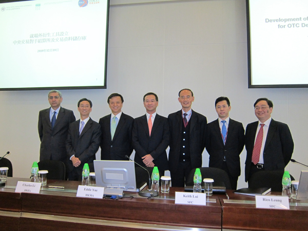 Deputy Chief Executive of the Hong Kong Monetary Authority Eddie Yue (middle), Executive Director of the Securities and Futures Commission Keith Lui (third from right) and Chief Executive of Hong Kong Exchanges and Clearing Limited Charles Li (third from left) attend a briefing on the latest developments of the establishment of a trade repository and a central counterparty for over-the-counter derivatives transactions in Hong Kong.