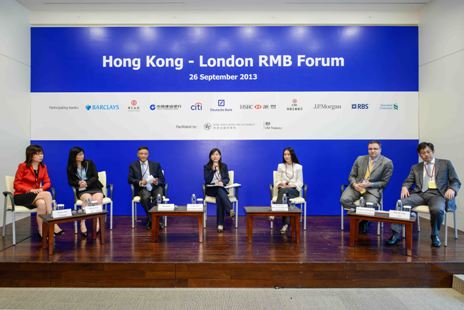 A panel of experts comprising corporate and banking sector representatives discussing opportunities in RMB trade settlement and banking services.