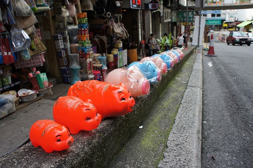 Piggy banks lining a street in Sheung Wan