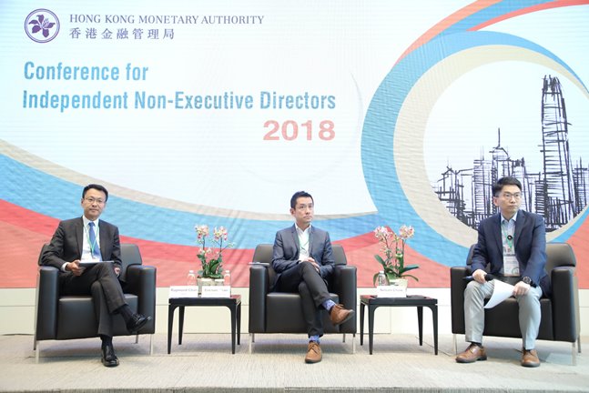 Mr Ericson Chan, Chief Executive Officer of Ping An Technology (middle) discusses how technology like blockchain, cloud computing and artificial intelligence would impact financial services. Mr Raymond Chan, Executive Director (Banking Supervision) of the HKMA (left) shares his views on the application of RegTech and SupTech. 