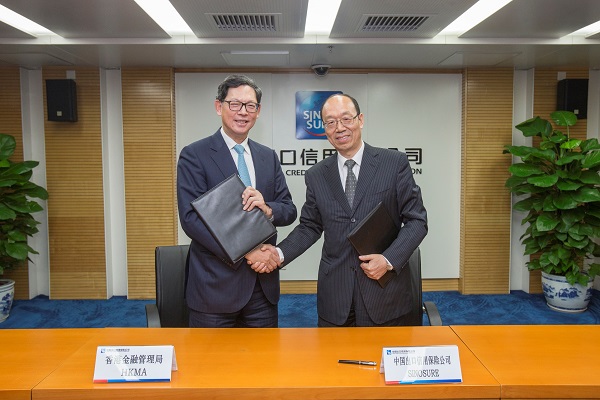 Mr Song Shuguang and Mr Norman Chan sign a Memorandum of Understanding to establish a strategic framework of cooperation, with a view to facilitating the financing of infrastructure projects.