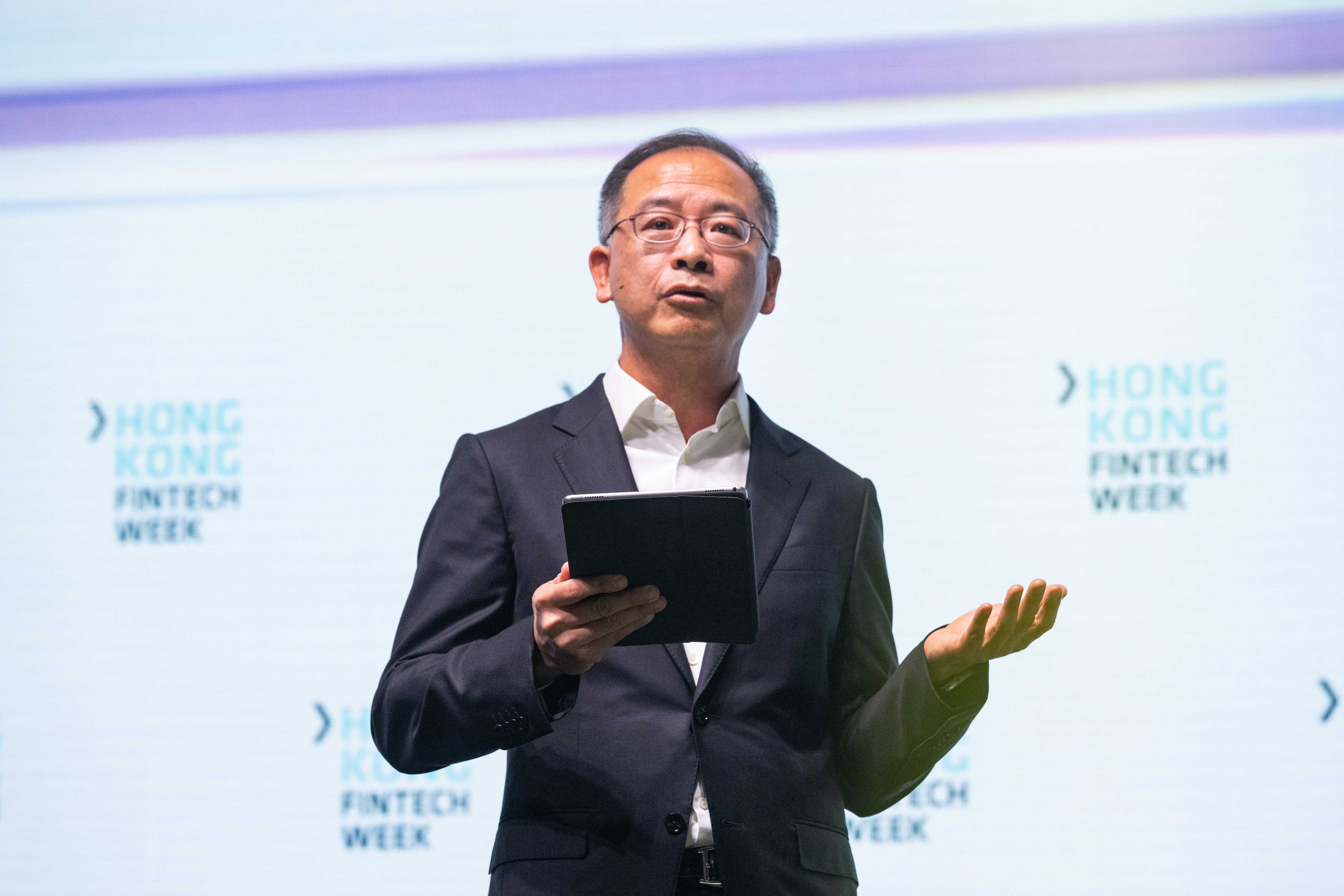 Photo shows the Chief Executive of the HKMA, Mr Eddie Yue, delivering the opening keynote at the Hong Kong FinTech Week 2022.