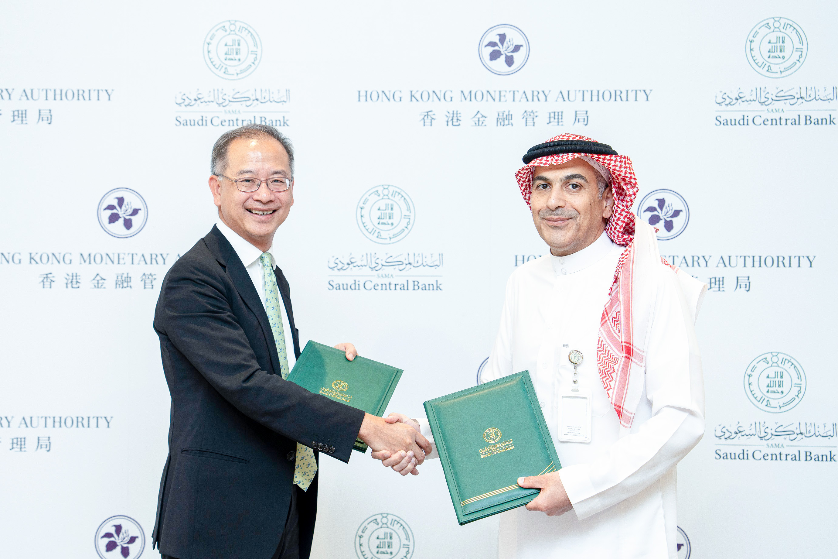 The Chief Executive of the Hong Kong Monetary Authority, Mr Eddie Yue (left) and the Governor of the Saudi Central Bank, Mr Ayman Alsayari (right) signed a Memorandum of Understanding on 26 July (Riyadh time) to promote collaboration on financial innovation.