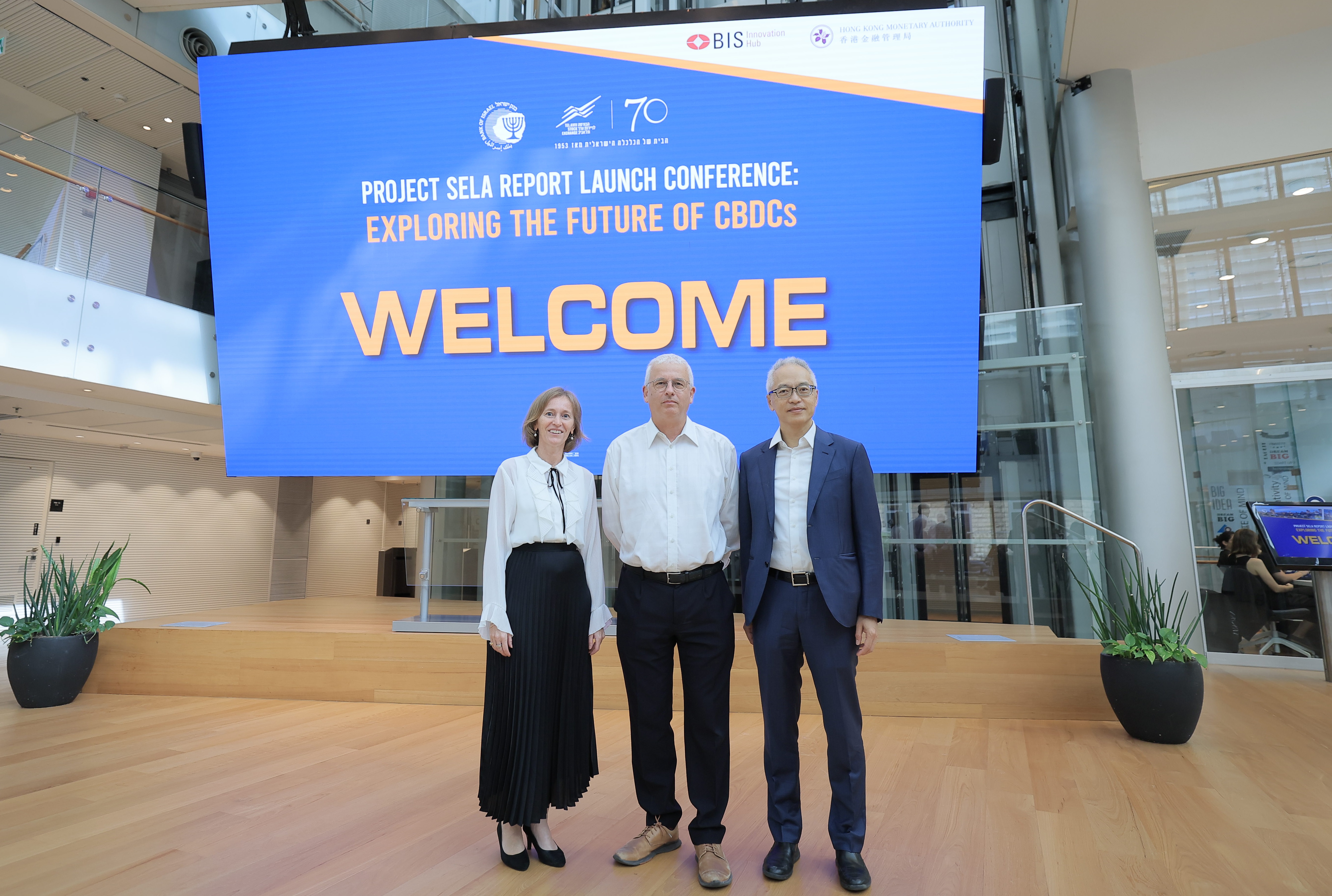 Mr Howard Lee (first from right), Deputy Chief Executive of the Hong Kong Monetary Authority; Mr Andrew Abir (second from right), Deputy Governor of the Bank of Israel; and Ms Bénédicte Nolens (first from left), Head of the Bank for International Settlements Innovation Hub Hong Kong Centre, attend the report launch conference of Project Sela in Tel Aviv, Israel.