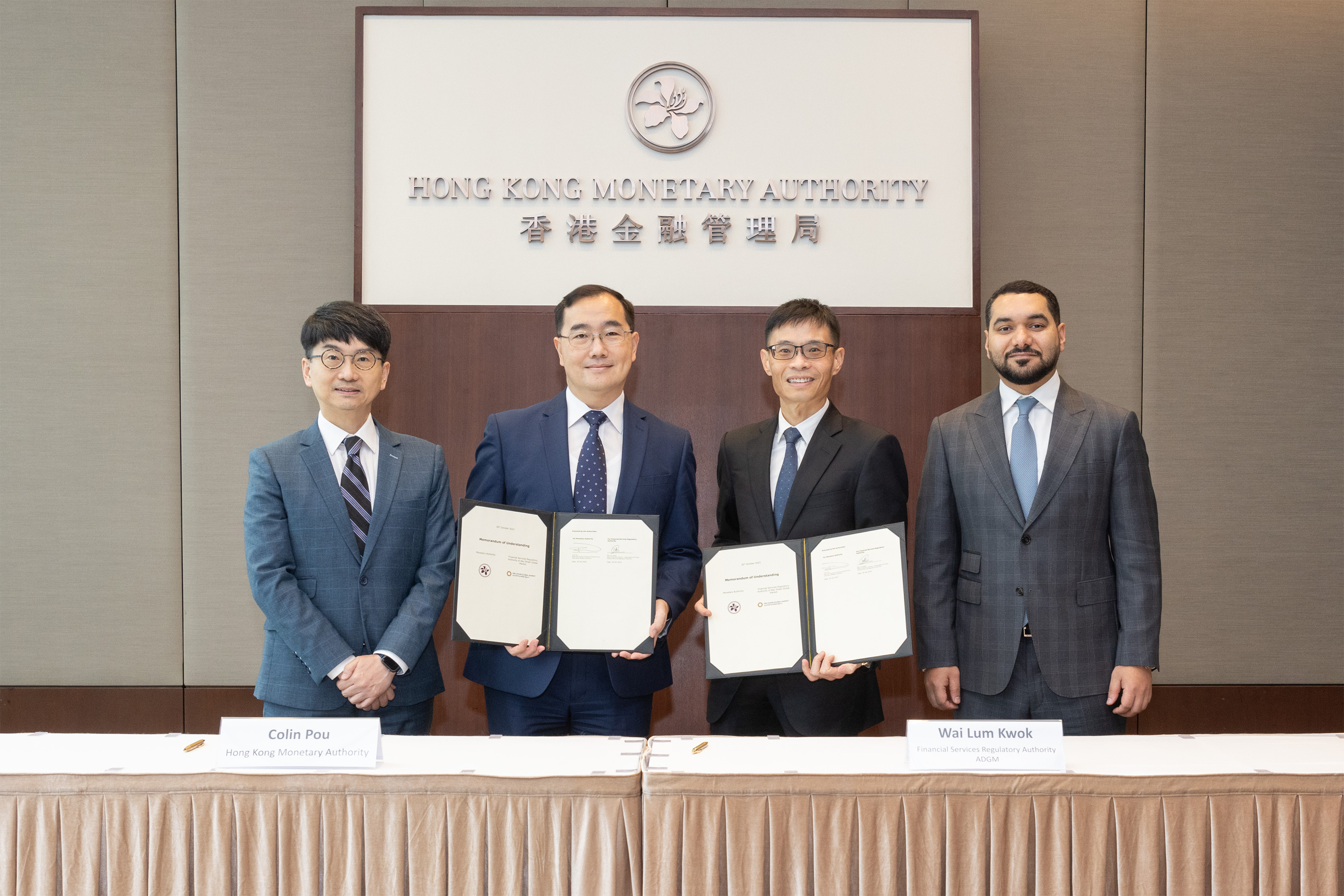 (From left) The Memorandum of Understanding signing ceremony is attended by Mr Nelson Chow, Head (Financial Market Infrastructure Service) of the Hong Kong Monetary Authority (HKMA); Mr Colin Pou, Executive Director (Financial Infrastructure) of the HKMA; Mr Wai Lum Kwok, Senior Executive Director - Authorisation & Fintech of the Financial Services Regulatory Authority; and H.E. Shaikh Saoud Al Mualla, Consul-General of the United Arab Emirates in the Hong Kong Special Administrative Region.