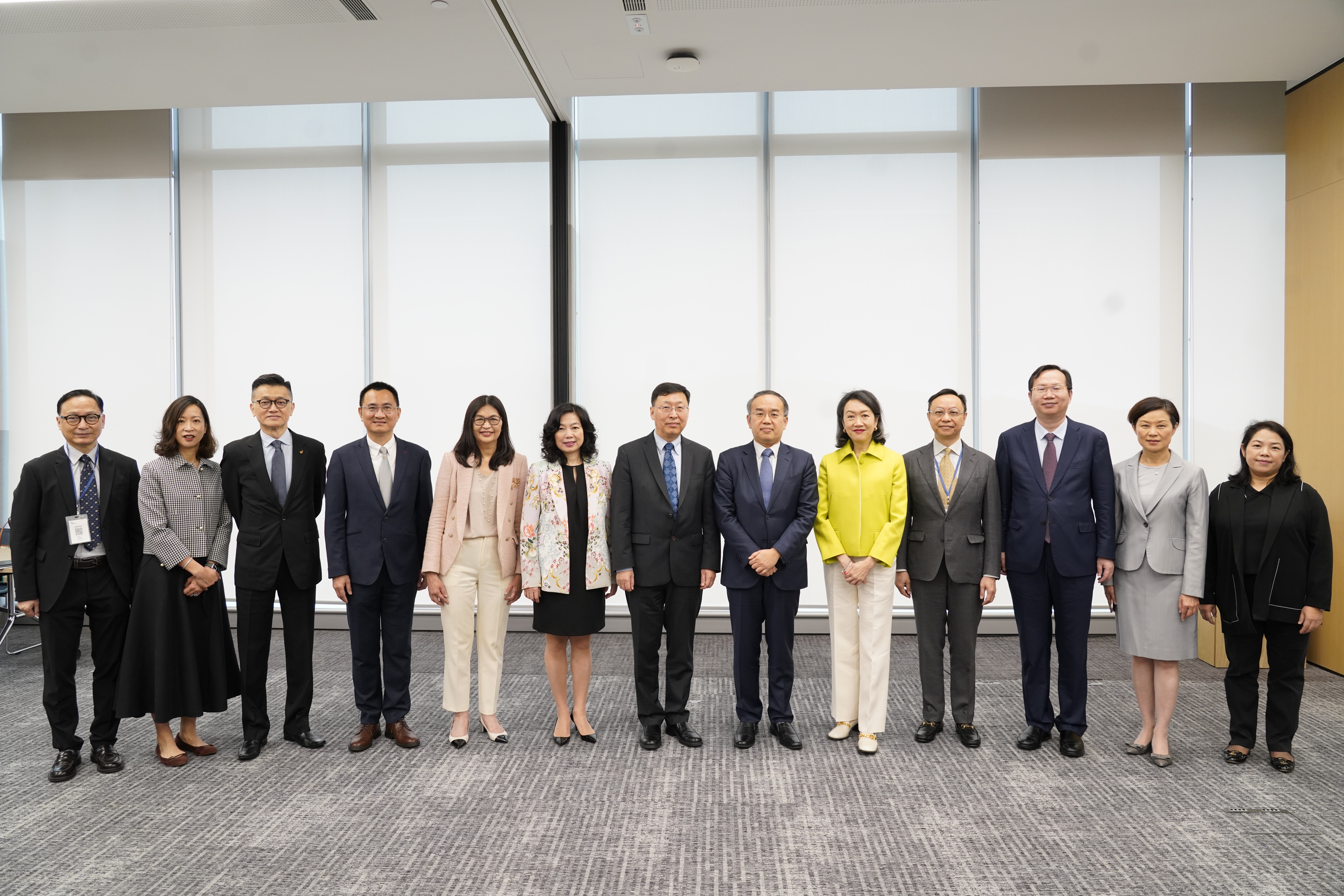 The roundtable of the Green and Sustainable Finance Cross-Agency Steering Group and the International Sustainability Standards Board is attended by (from left): Mr Clement Cheung, the Chief Executive Officer of the Insurance Authority; Ms Katherine Ng, the Head of Listing of the Hong Kong Exchanges and Clearing Limited; Mr Cheng Yan-chee, the Managing Director of the Mandatory Provident Fund Schemes Authority; Mr Wong Chuen-fai, the Commissioner for Climate Change of the Environmental and Ecology Bureau; Ms Julia Leung, the Chief Executive Officer of the Securities and Futures Commission; Ms Salina Yan, the Permanent Secretary for Financial Services and the Treasury (Financial Services); Mr Hua Jingdong, the Vice Chair of the International Sustainability Standards Board; Mr Christopher Hui, the Secretary for Financial Services and the Treasury; Ms Teresa Ko, the Vice Chair of the International Financial Reporting Standards Foundation Trustees; Mr Darryl Chan, Deputy Chief Executive of the Hong Kong Monetary Authority; Mr Zhang Zhengwei, the Beijing Office Director and Special Adviser to Chair of the International Sustainability Standards Board; Ms Margaret Chan, the Chief Executive and Registrar of the Hong Kong Institute of Certified Public Accountants; and Ms Janey Lai, the Acting Chief Executive Officer of the Accounting and Financial Reporting Council.